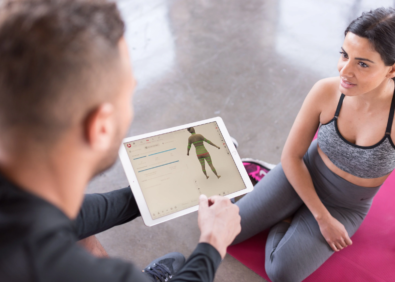 A person being scanned by the 3D Scanner Styku, offering precise body measurements for a tailored fitness and health analysis